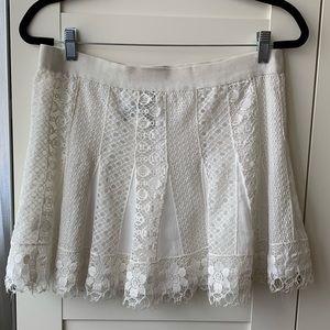 BCBG Maxazria white lined lace mini skirt size M
